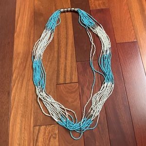Multi string beaded necklace